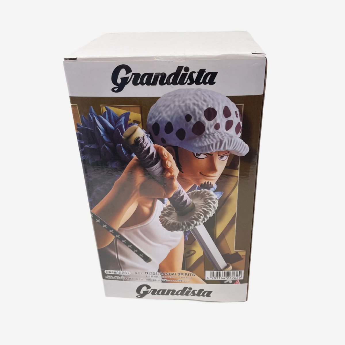 Box of a 'Grandista' product featuring an animated character with a hat and staff.