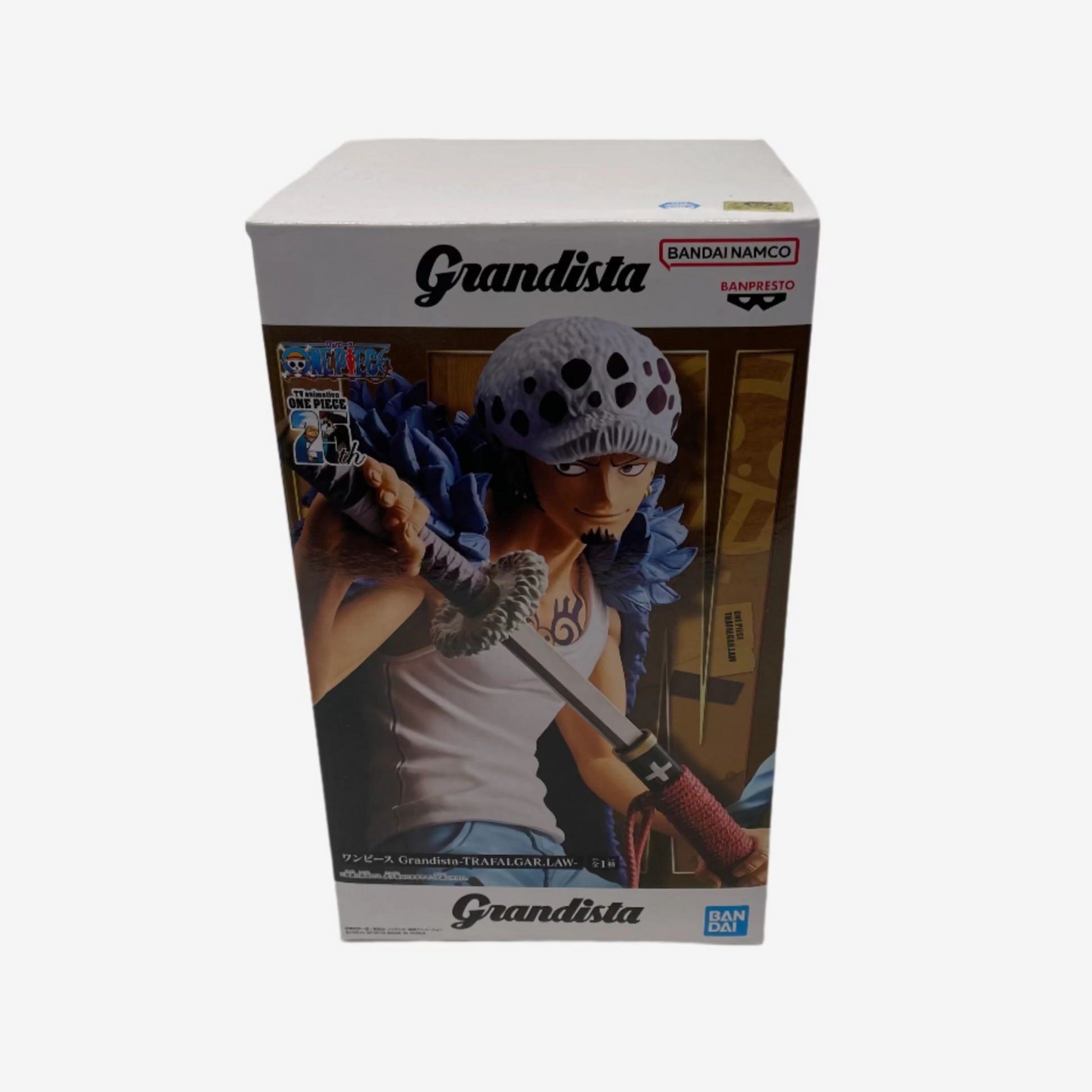 Boxed figurine of a character with a helmet and weapon, featuring 'Grandista' branding.
