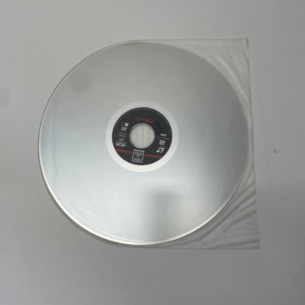 Clear vinyl record with a label on a gray background