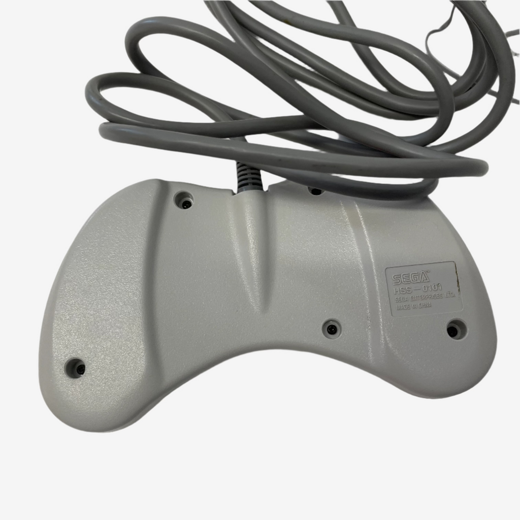 Gray electronic device with coiled cable on a white background