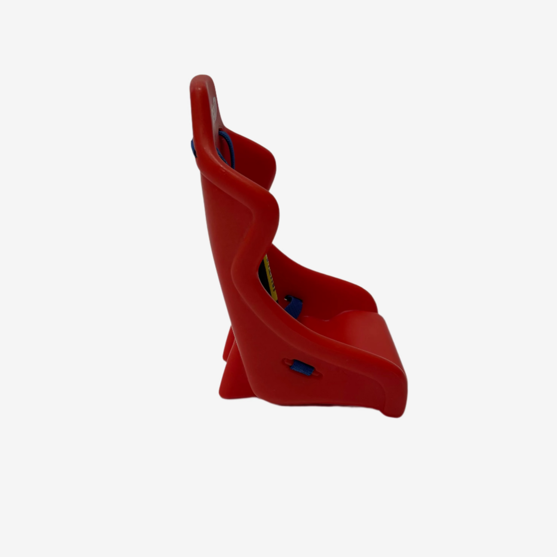 Red plastic climbing hold on a white background