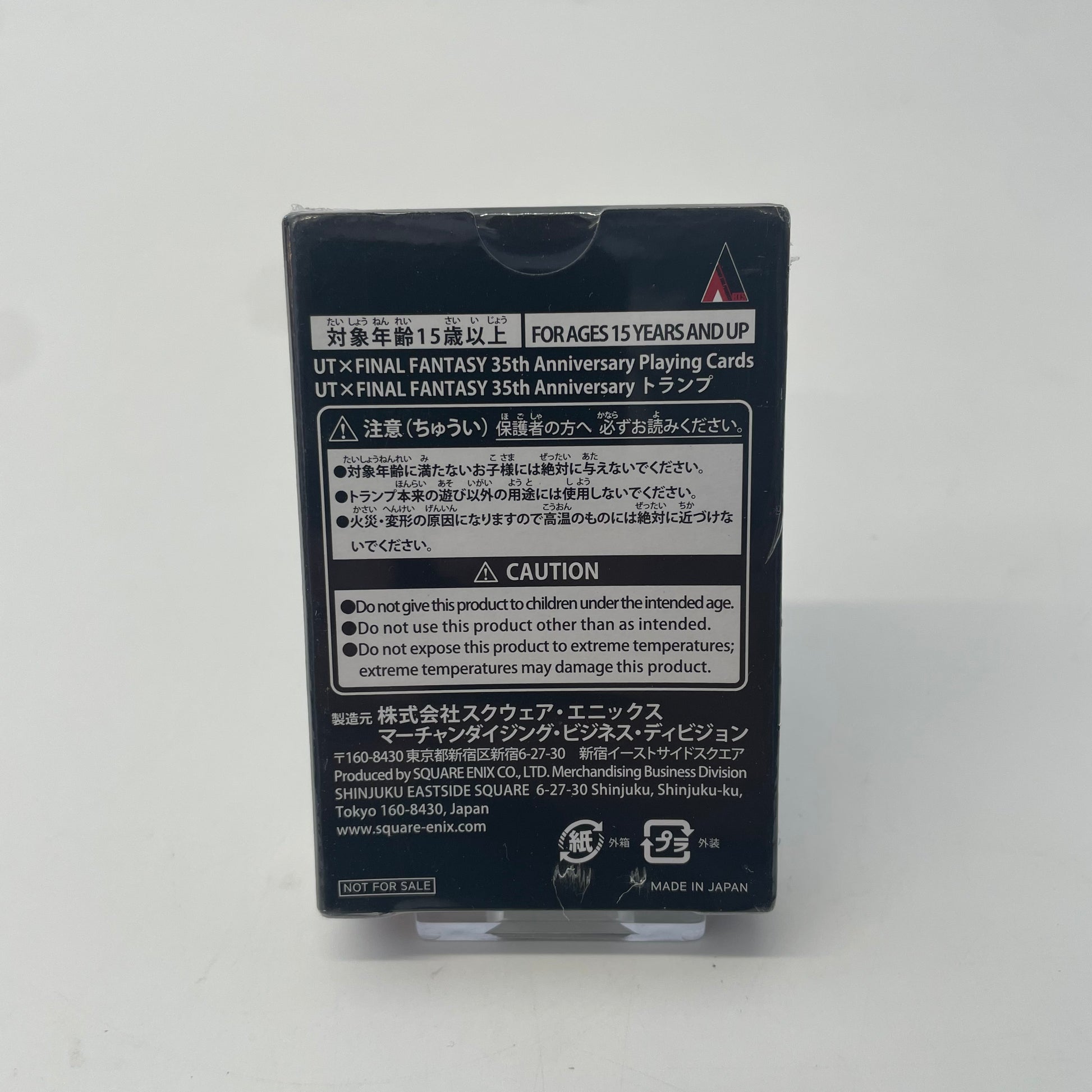 Card game packaging with text and logos on a white background
