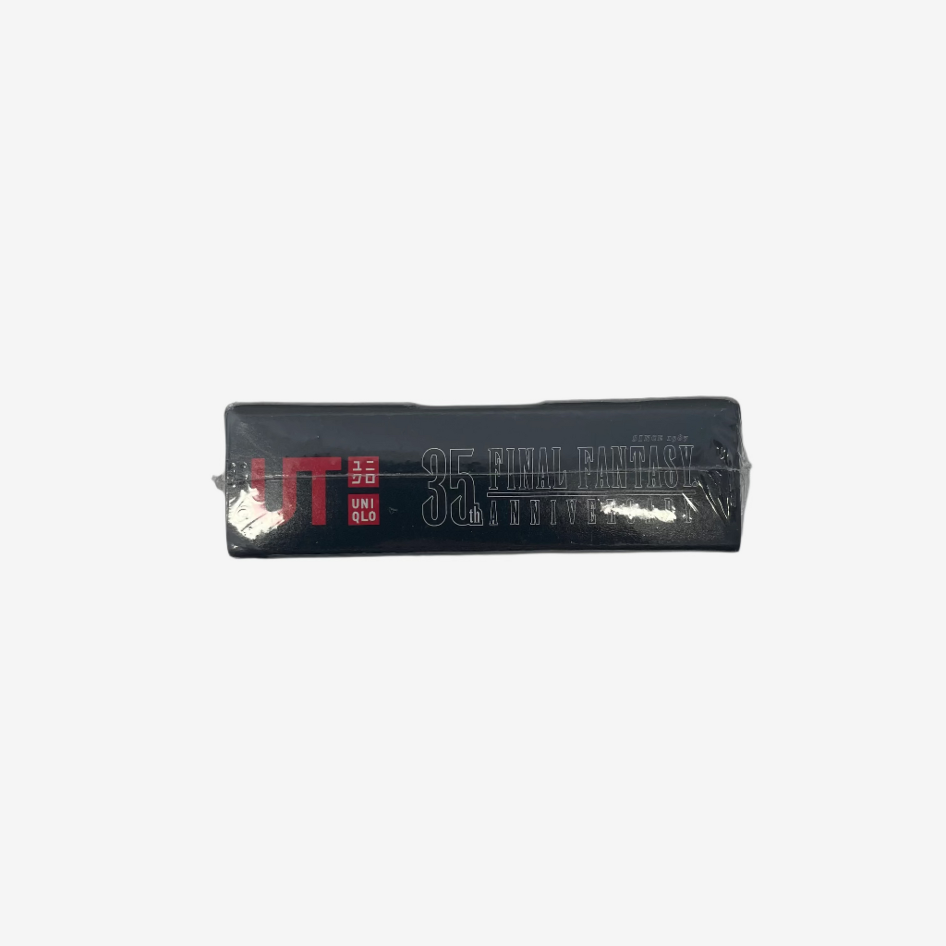 Black rectangular product box with text on a gray background