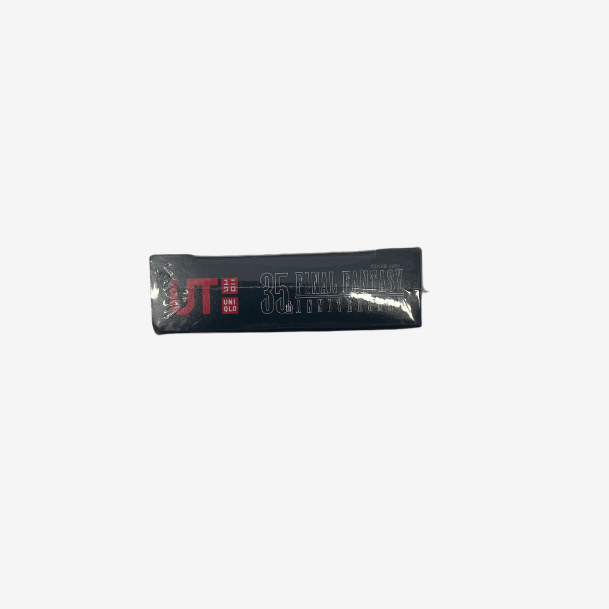 Black rectangular product with red and white text on a white background