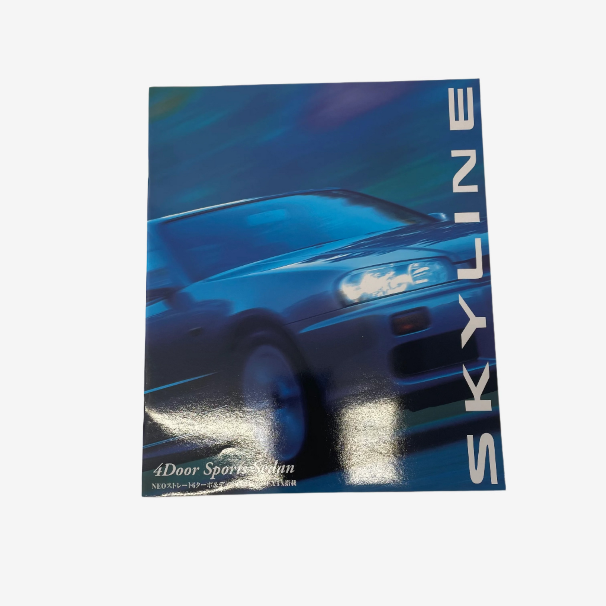 Brochure or flyer for a blue car model with 'Skyline' branding on a white background