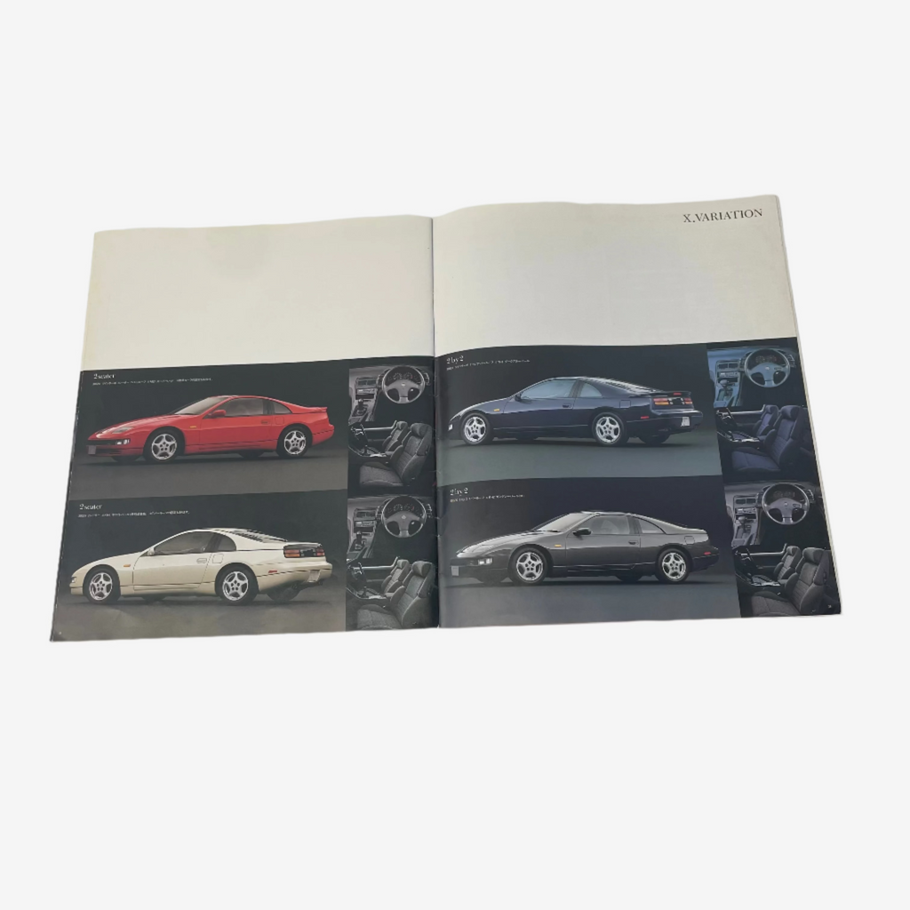 Open book or magazine with car illustrations on a white background