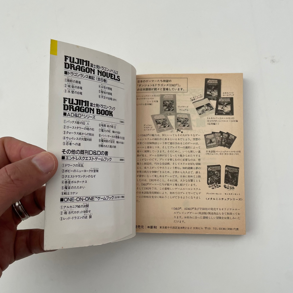 Open book with text and images on a white background