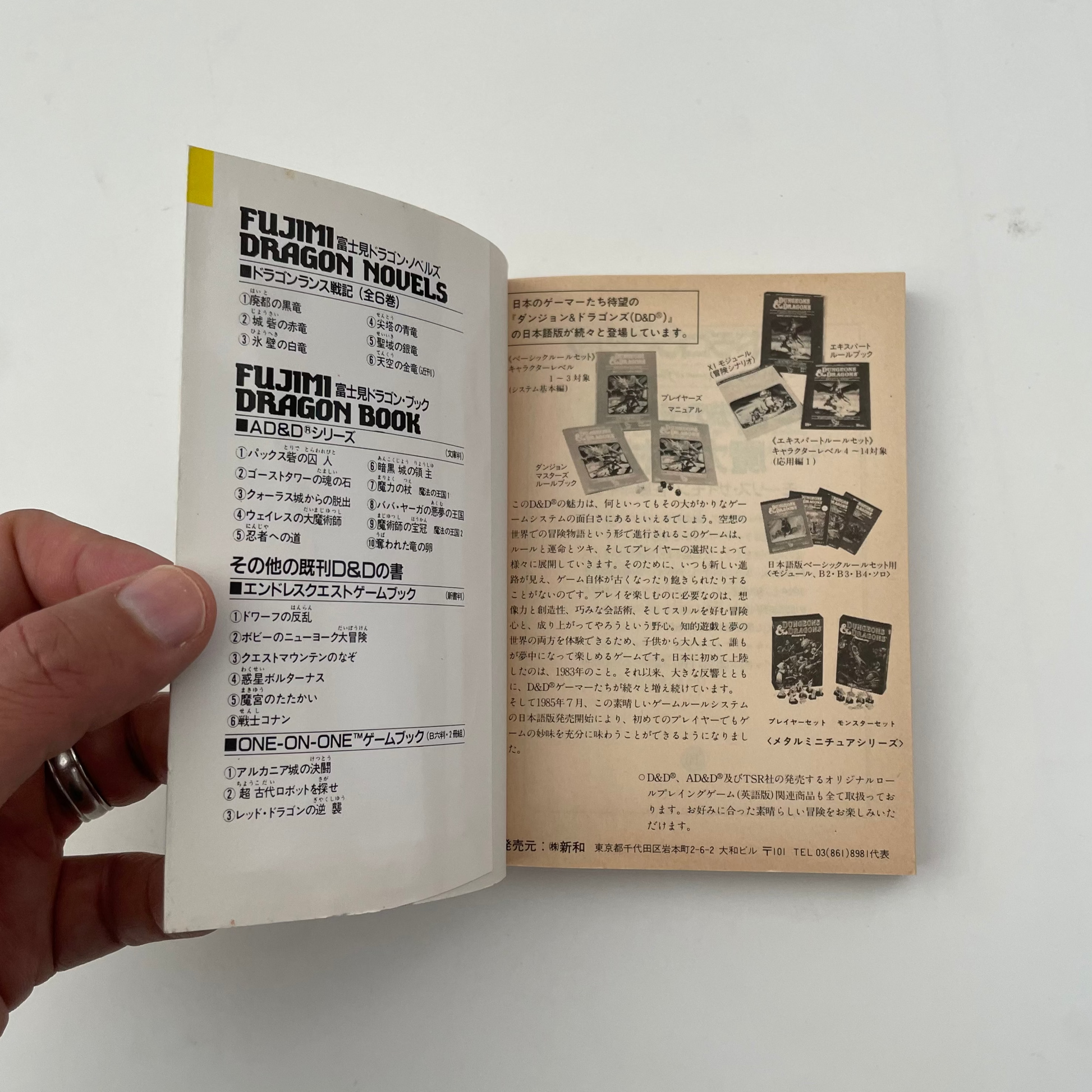 Open book with text and images on a white background