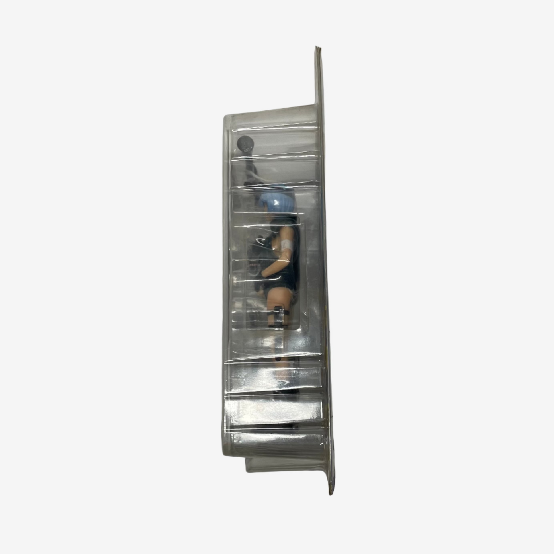 Metallic wall-mounted shelf with a small figurine on a plain background