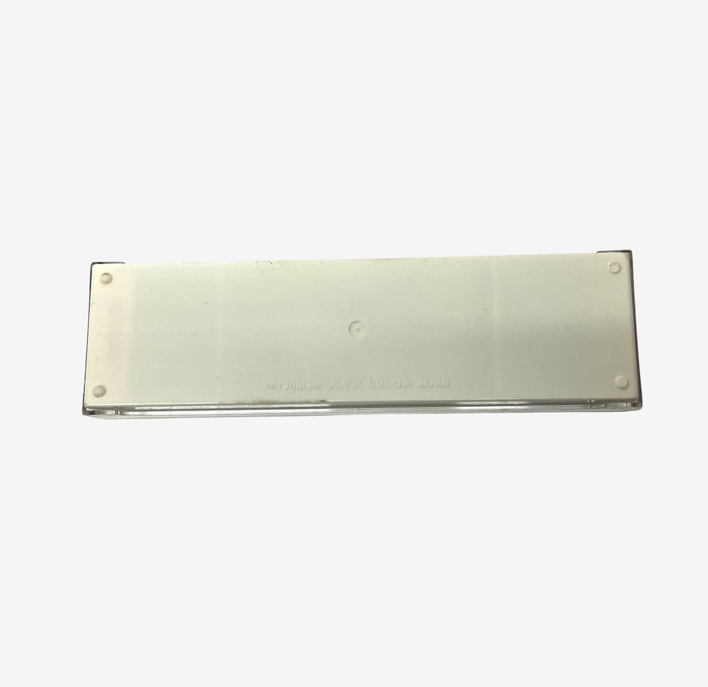 Rectangular metal object with a reflective surface on a white background