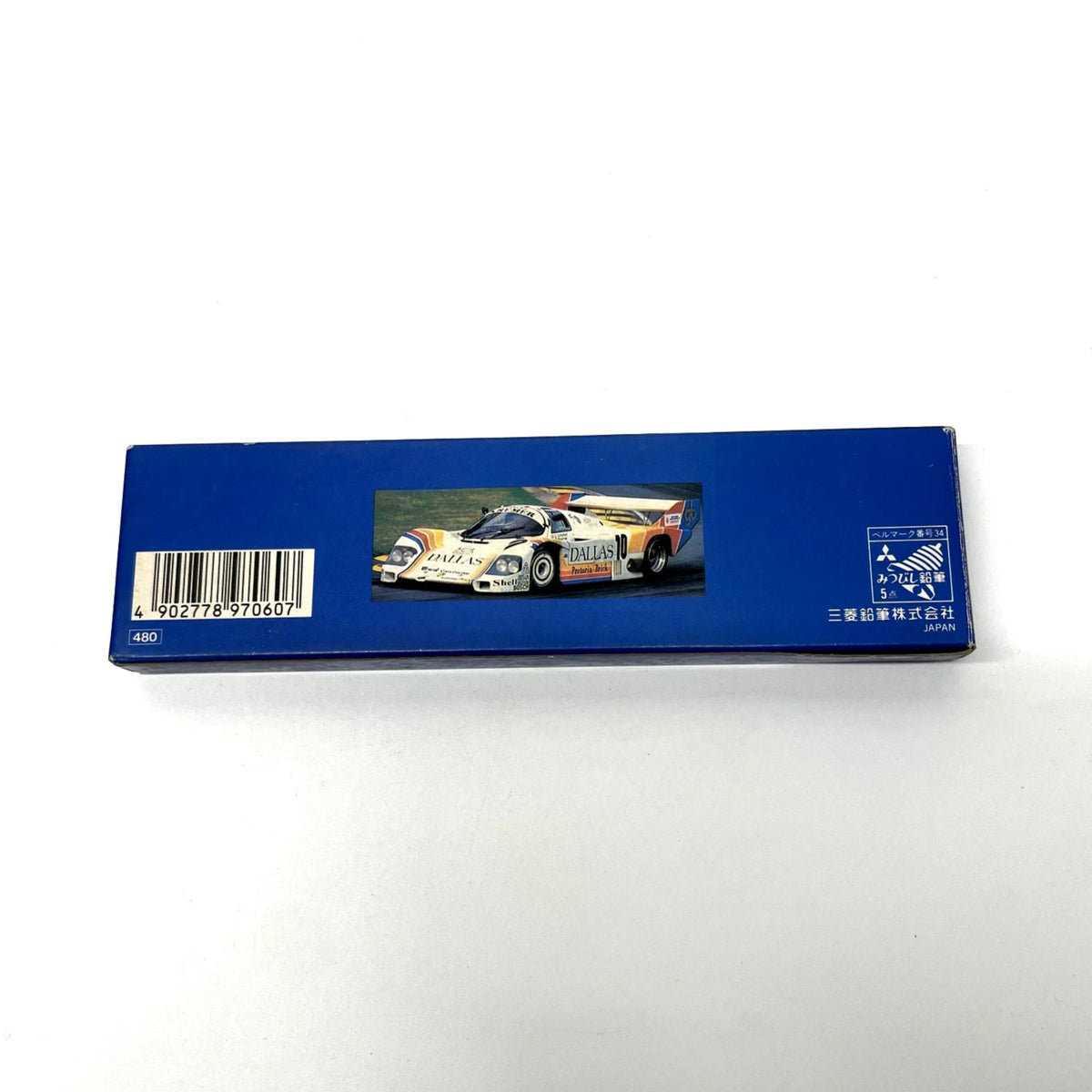 Model car packaging with a blue box featuring a car illustration on a white background