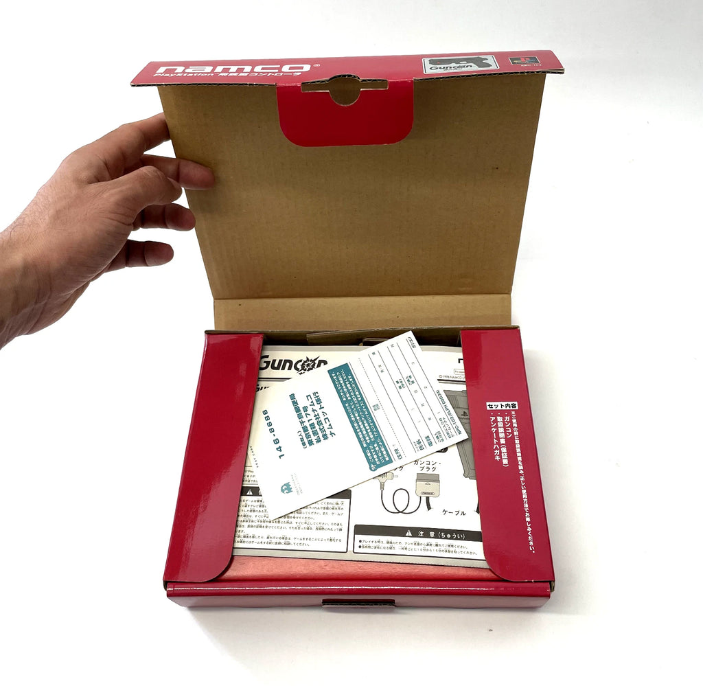 Open box with Namco branding on a white background