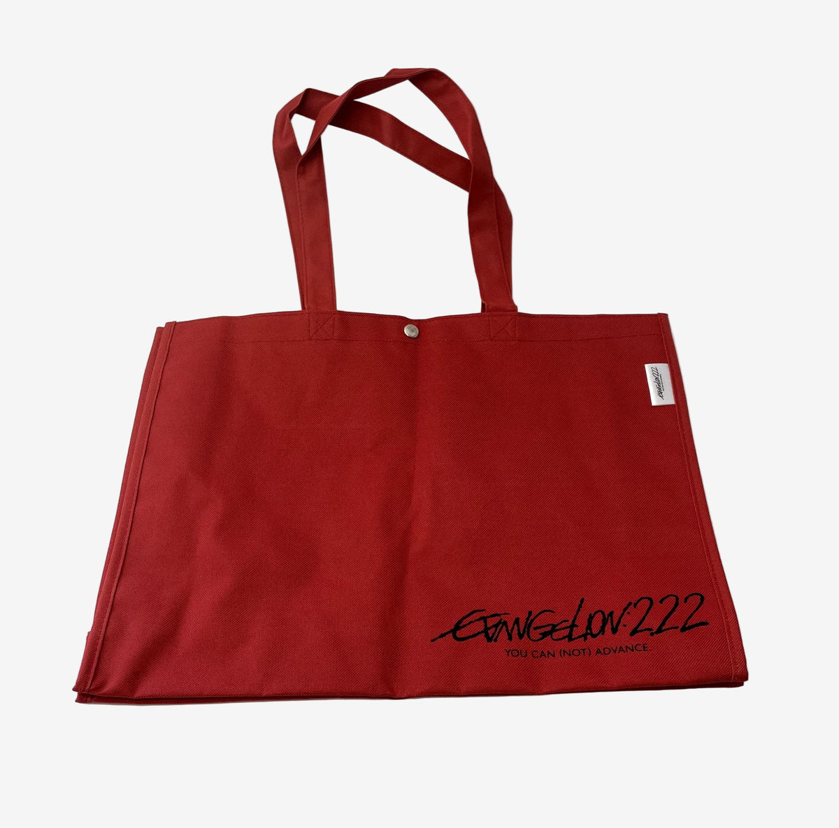 Red tote bag with 'Evangelion 222' text on a white background