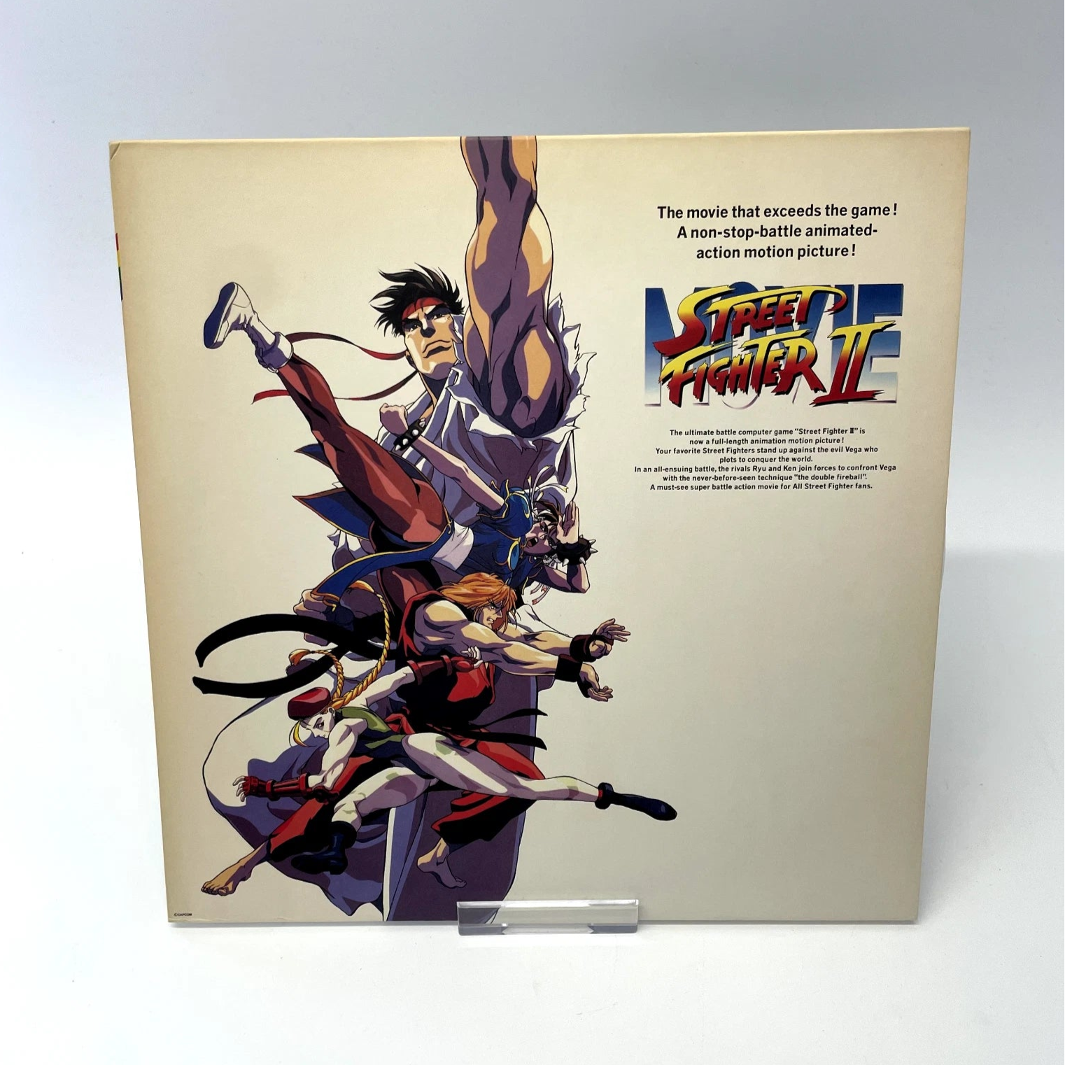 Promotional poster for 'Street Fighter II' movie with animated characters and text.