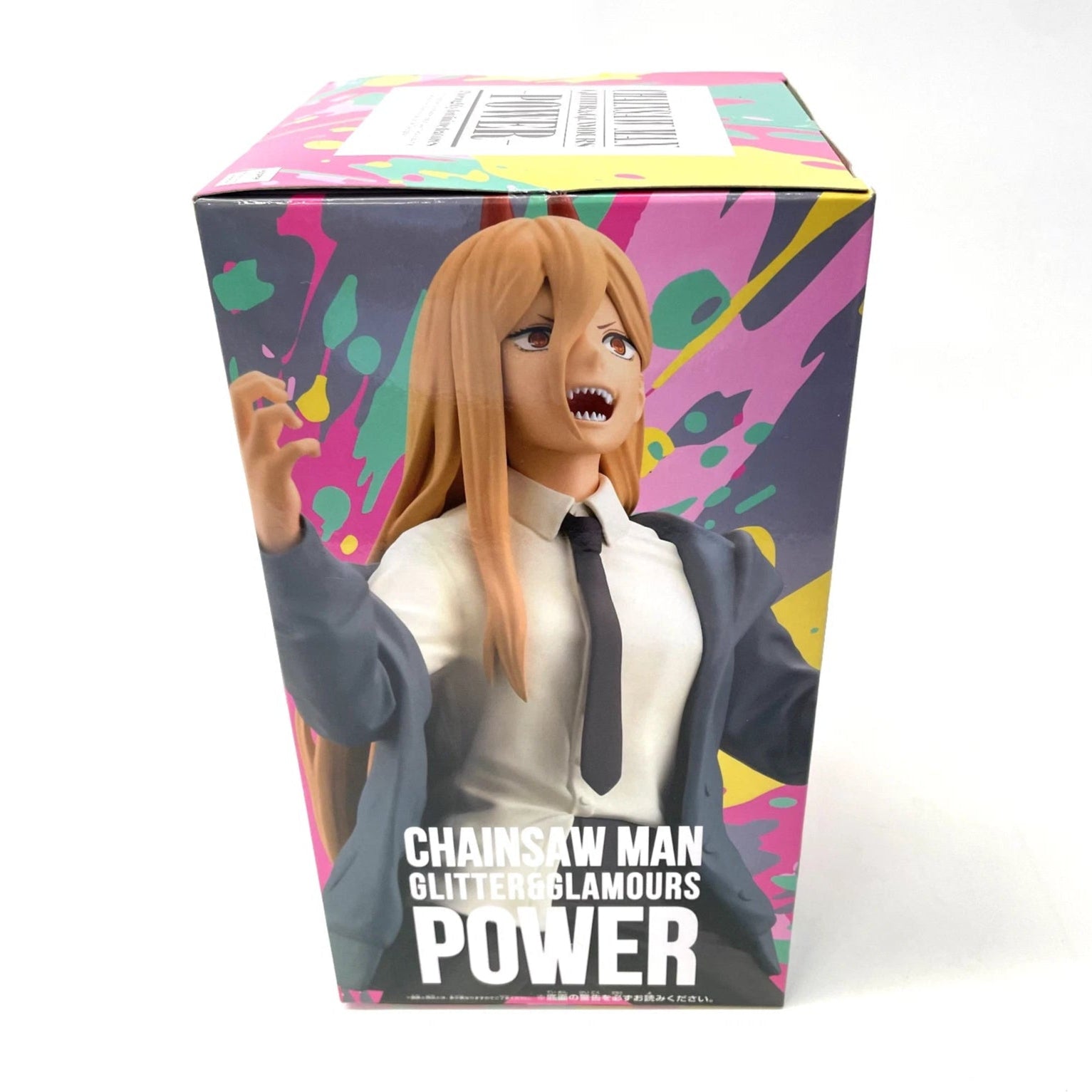 Figurine with colorful packaging featuring text 'Chainsaw Man Glitter Glamours Power'.